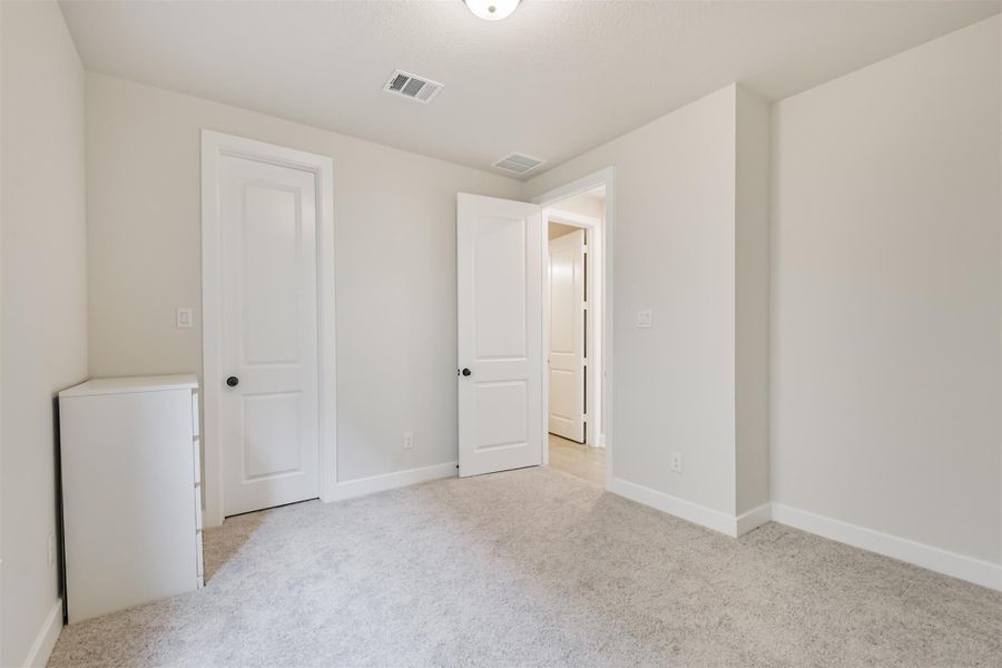 Spacious, unfurnished interior of a new home in The Woodlands Hills – 55', Willis (Image 18).