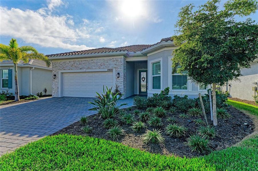 Front exterior of a new home in , Englewood, FL, highlighting curb appeal (Image 28). Front exterior of a new home in , Englewood, FL, highlighting curb appeal (Image 28).