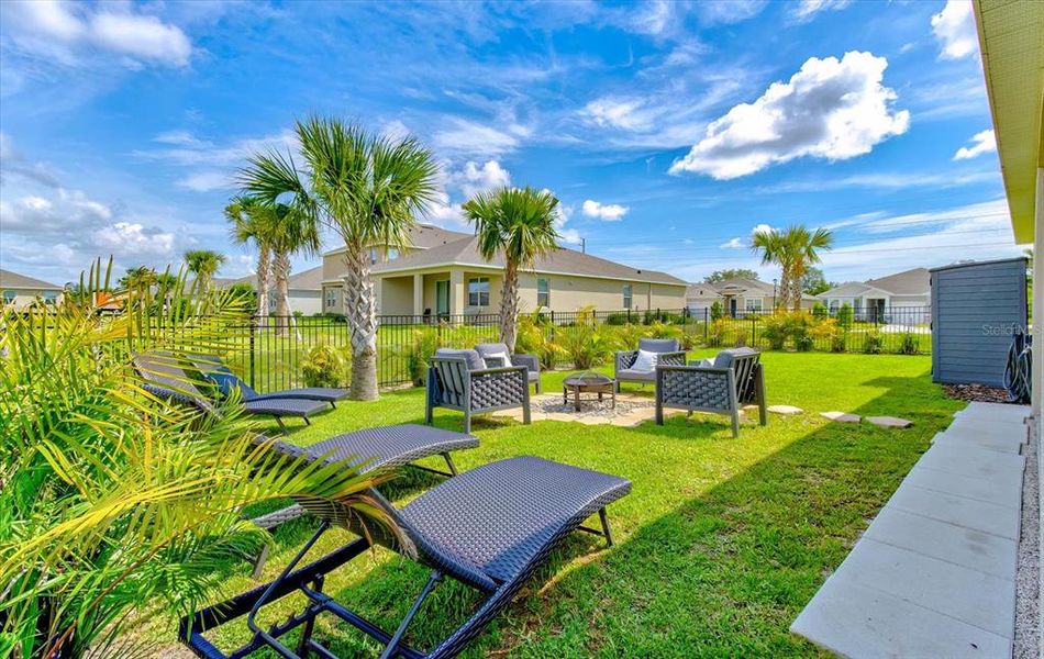 Exterior details and patio area of a home in Archers Mill, Ormond Beach (Image 29).