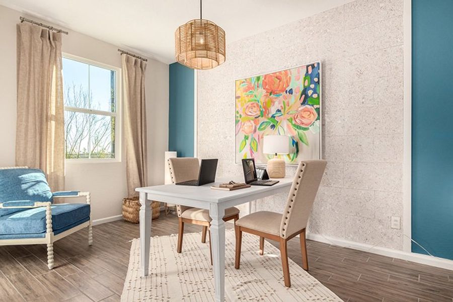 A room with a table and chairs. A room with a table and chairs.
