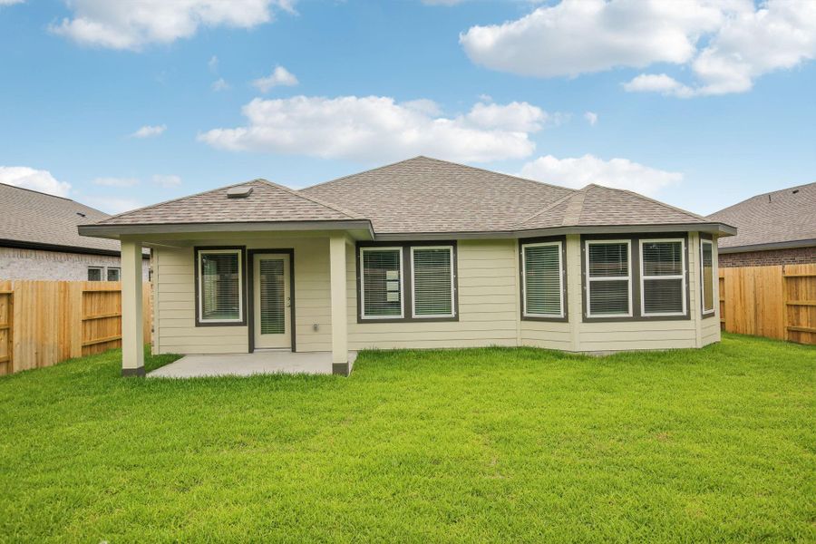 Front exterior of a new home in Massey Oaks - Premier Series, Pearland, TX, highlighting curb appeal (Image 24). Front exterior of a new home in Massey Oaks - Premier Series, Pearland, TX, highlighting curb appeal (Image 24).