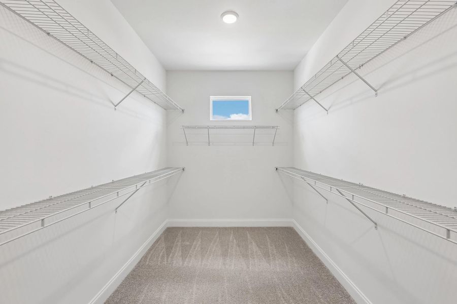 Primary Walk-in Closet Primary Walk-in Closet
