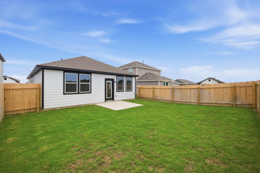 Exterior details and patio area of a home in Stallion Run, Buda (Image 26).