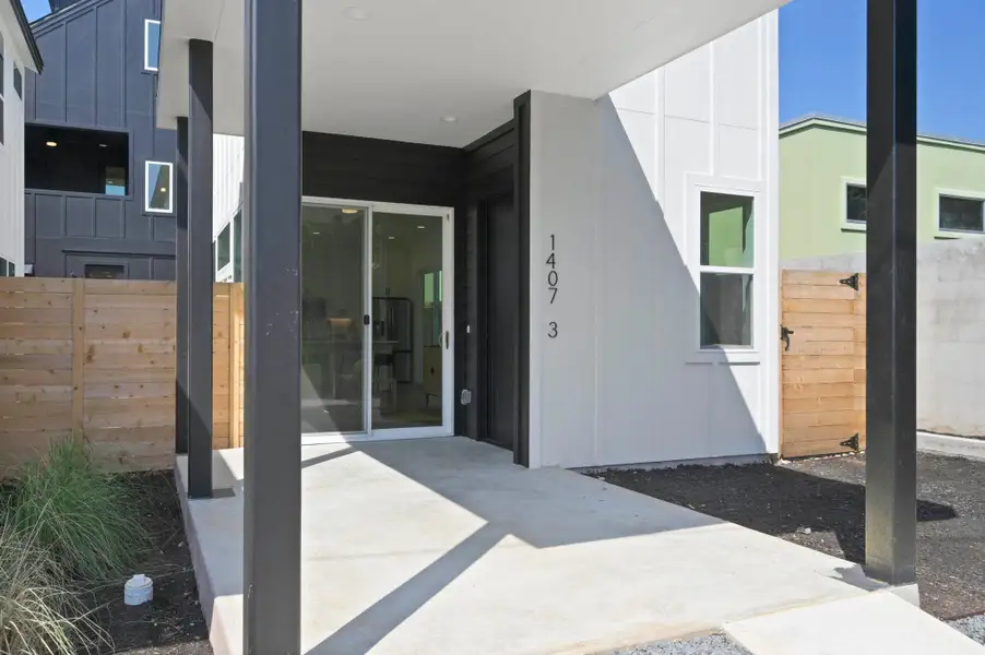 Property entrance with board and batten siding Property entrance with board and batten siding