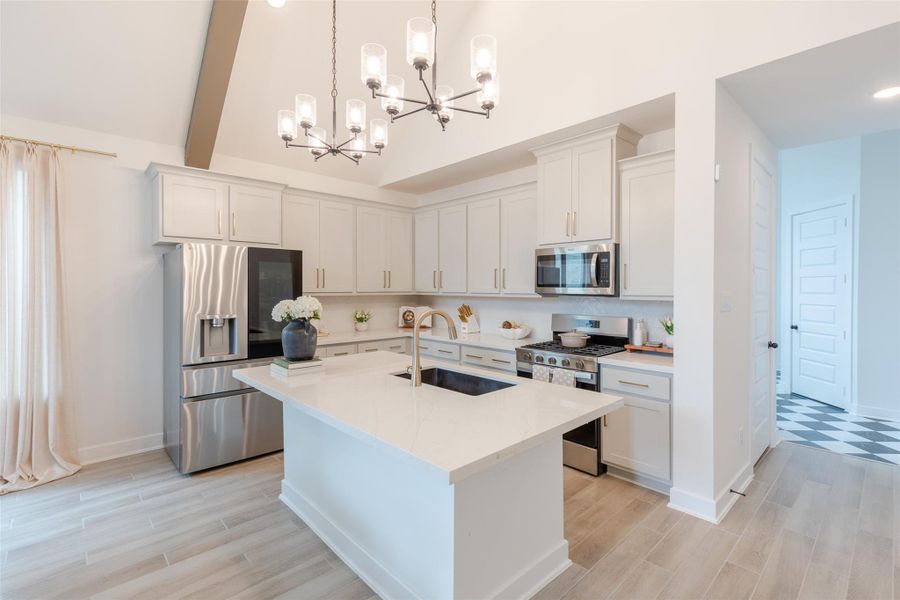 Stylish chandelier's above your large center island