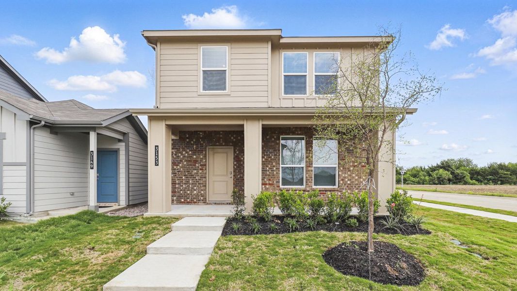 Representative exterior photo of a completed home built from the NUTMEG by D.R. Horton in Orchard Village, Fort Worth, TX (Image 19). Representative exterior photo of a completed home built from the NUTMEG by D.R. Horton in Orchard Village, Fort Worth, TX (Image 19).