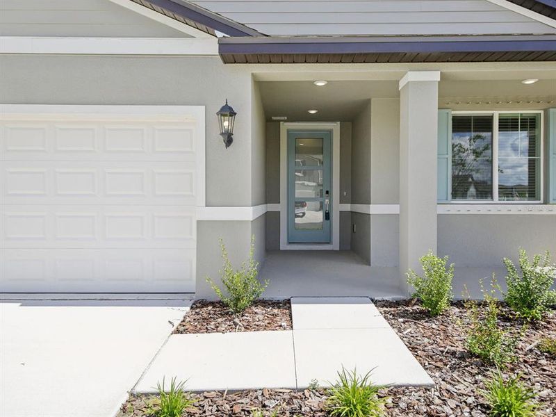 Exterior details and patio area of a home in Salt Meadows - Signature Series, Parrish (Image 19). Exterior details and patio area of a home in Salt Meadows - Signature Series, Parrish (Image 19).