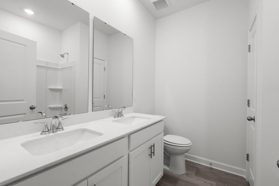 Furnished interior view inside a new home in Cypress Ridge - The Coastline Series, Longs (Image 11). Furnished interior view inside a new home in Cypress Ridge - The Coastline Series, Longs (Image 11).