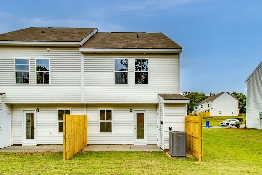 Exterior details and patio area of a home in Padgett Commons, Hopkins (Image 18).