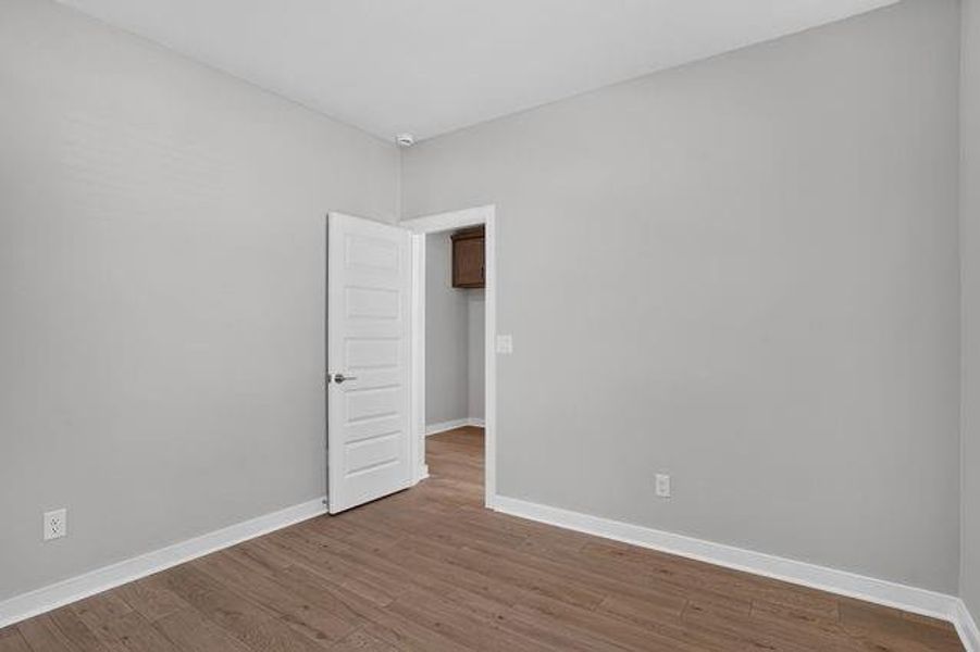 Spacious, unfurnished interior of a new home in The Cottages at East Lanier, Fayetteville (Image 13).