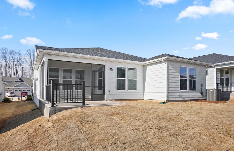 Exterior details and patio area of a home in Carolina Riverside, Belmont (Image 22).