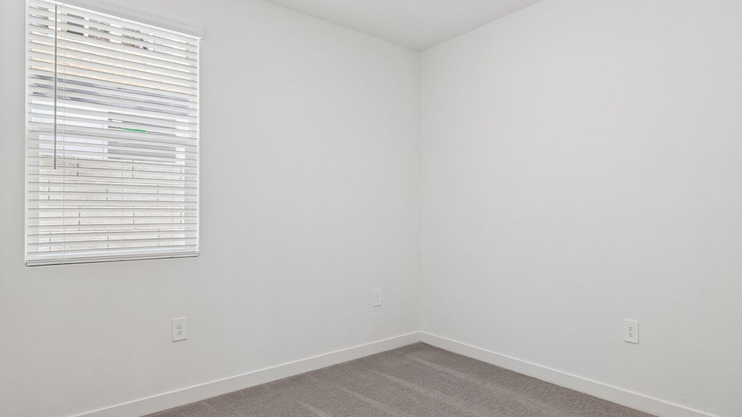 Spacious, unfurnished interior of a new home in The Ridge at Stone Butte, Phoenix (Image 22).