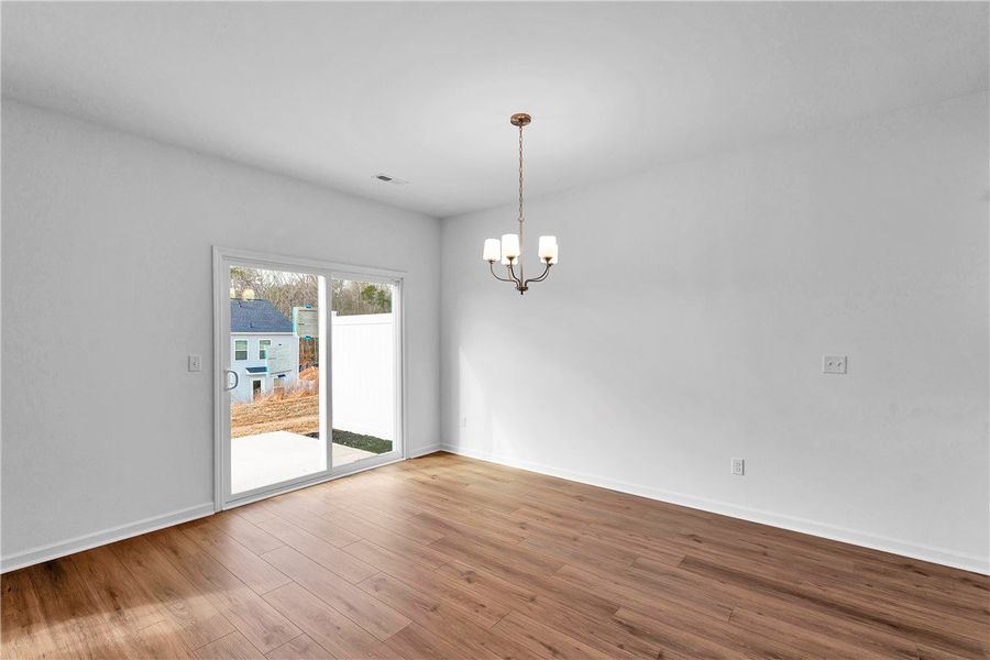 This bright space features natural light and durab