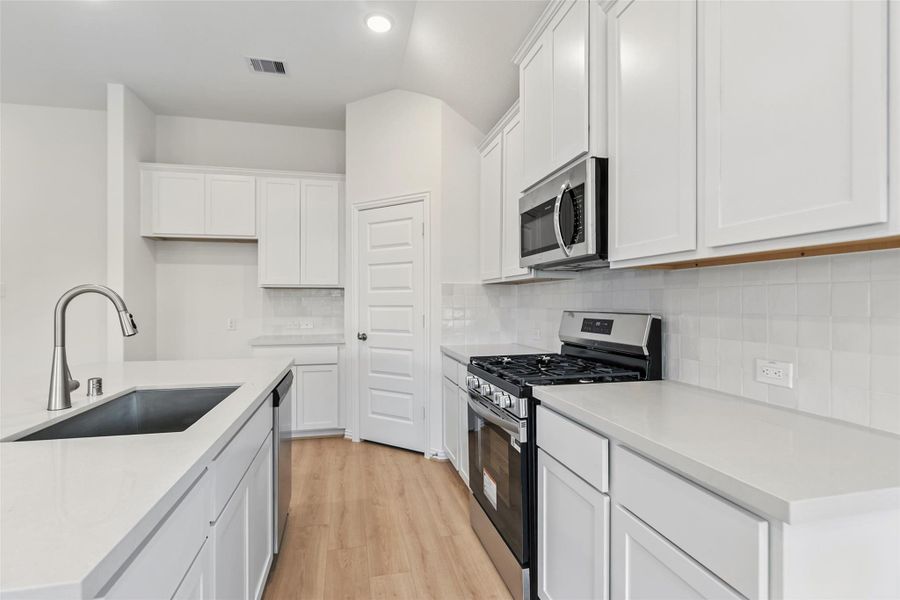 Furnished interior view inside a new home in Oakwood Estates, Waller (Image 11).
