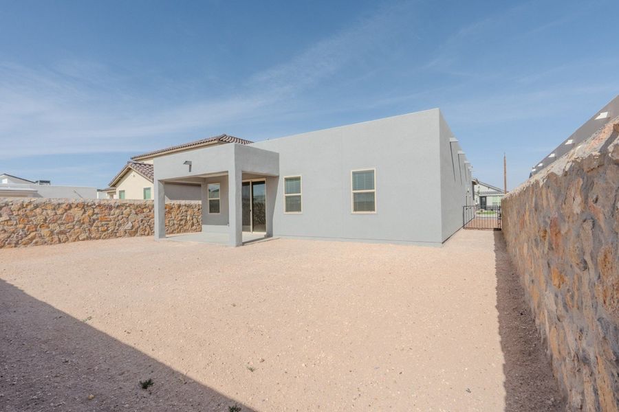 Exterior details and patio area of a home in Paseo Del Este, El Paso (Image 3).