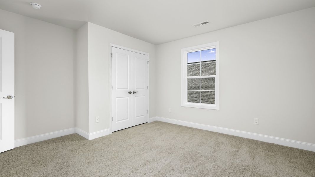 Spacious, unfurnished interior of a new home in The Villas at Kinsley, Jamestown (Image 20).
