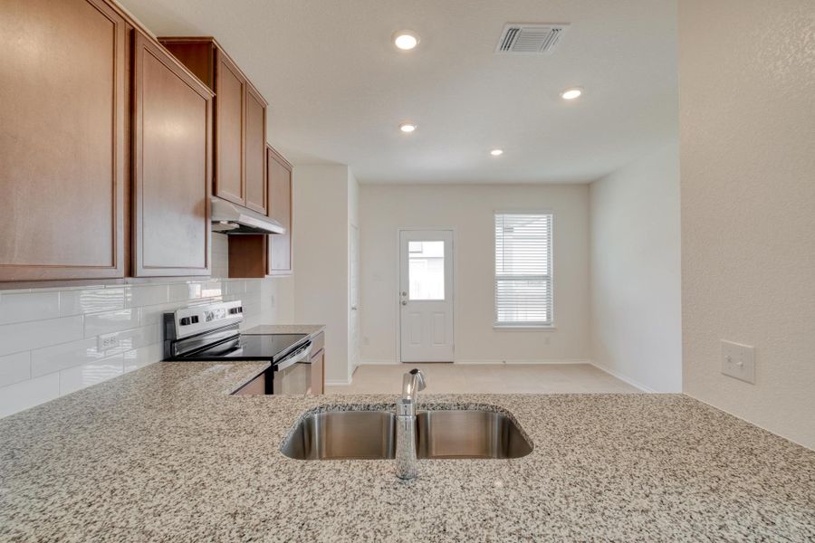 Furnished interior view inside a new home in Sonterra - Cool Water, Jarrell (Image 6).