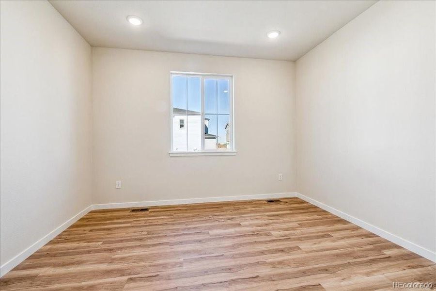 Spacious, unfurnished interior of a new home in Floret Collection at Alder Creek, Parker (Image 26).