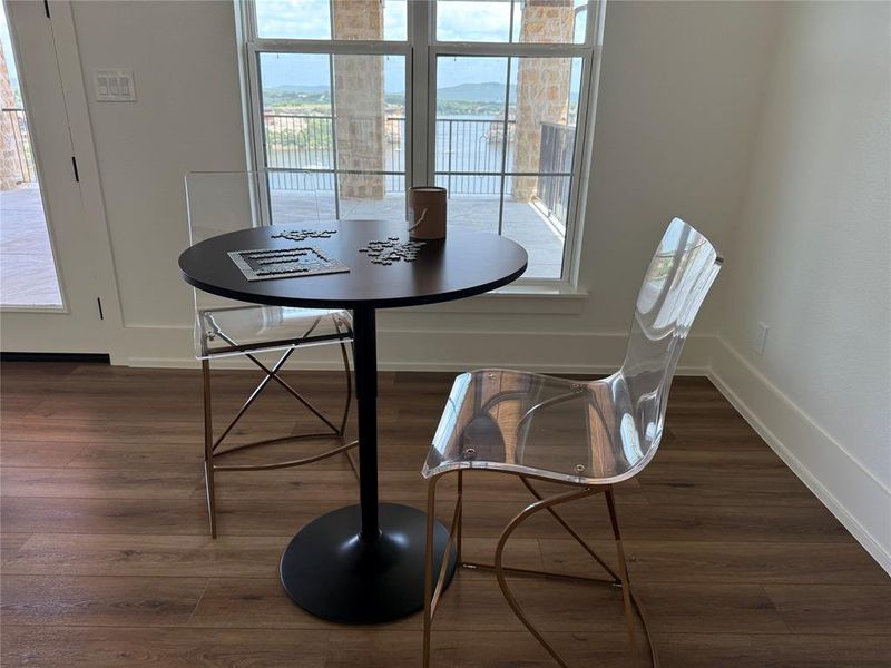 Dining area featuring wood finished floors and baseboards Dining area featuring wood finished floors and baseboards