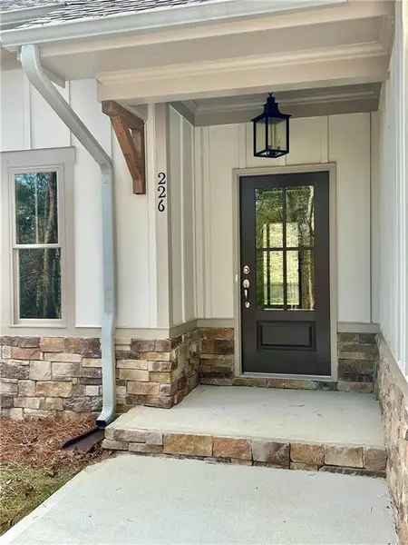 Exterior details and patio area of a home in , Waleska (Image 3).