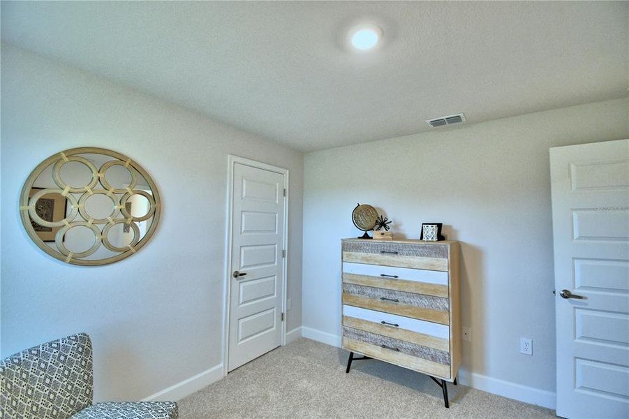 Furnished interior view inside a new home in Cadence Crossing, Auburndale (Image 30).
