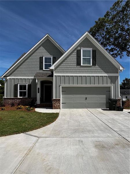 Front exterior of a new home in , Marietta, GA, highlighting curb appeal (Image 1). Front exterior of a new home in , Marietta, GA, highlighting curb appeal (Image 1).