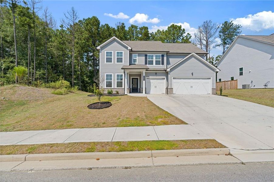 Front exterior of a new home in , Dallas, GA, highlighting curb appeal (Image 29).
