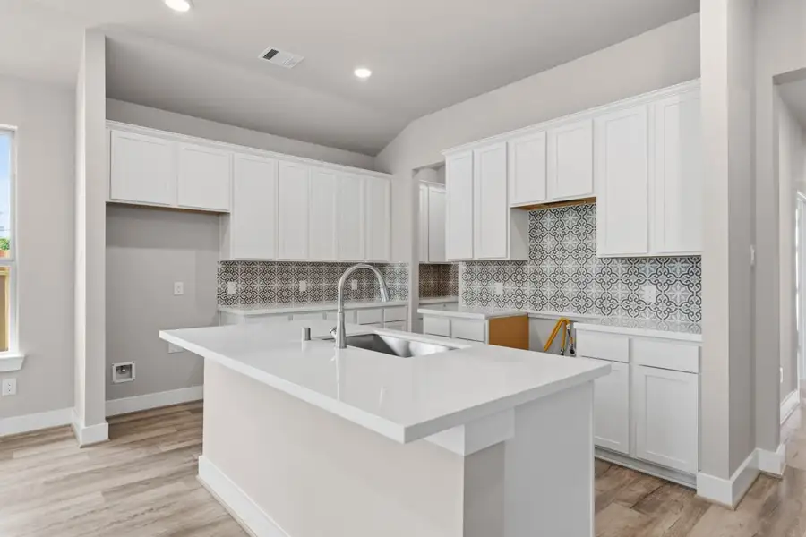 Furnished interior view inside a new home in Trinity Grove, Spring (Image 4).