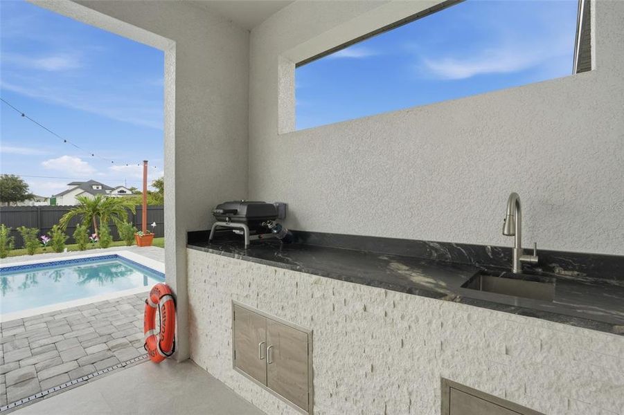 Exterior details and patio area of a home in , Cape Coral (Image 31).
