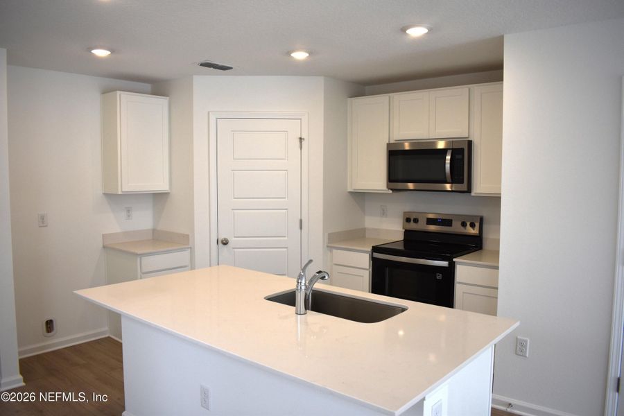 Furnished interior view inside a new home in Irongate Villas, Jacksonville (Image 11).