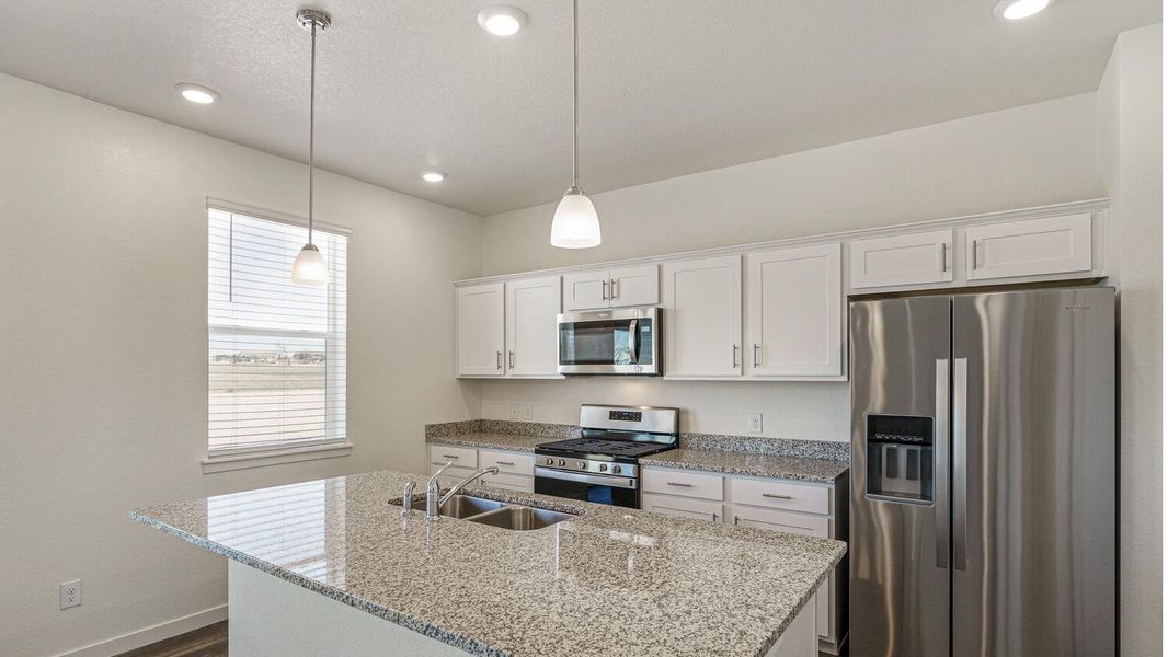 Furnished interior view inside a new home in Silver Peaks, Lochbuie (Image 5).
