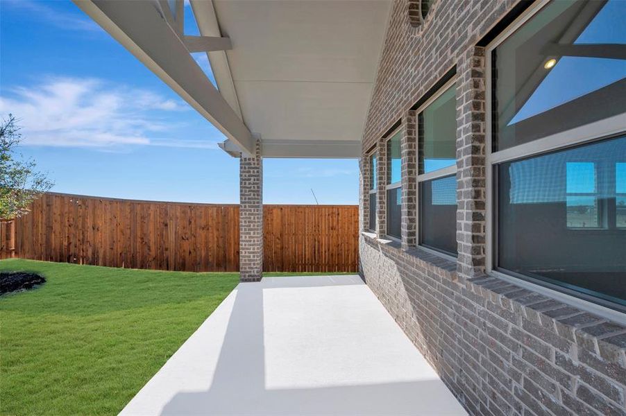 Exterior details and patio area of a home in Timberbrook, Justin (Image 22).