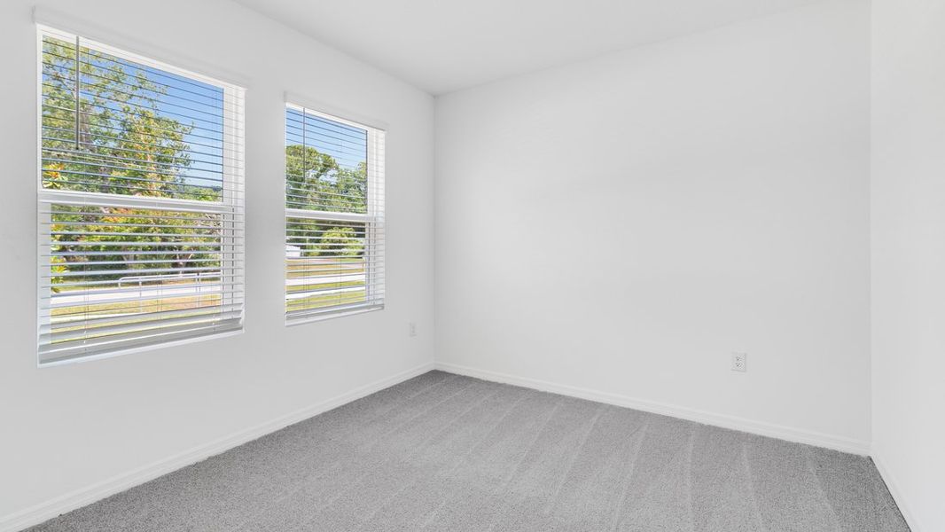 Representative unfurnished interior of a home built from the Ambrosia by Taylor Morrison in Aden South at Westview, Kissimmee (Image 21).