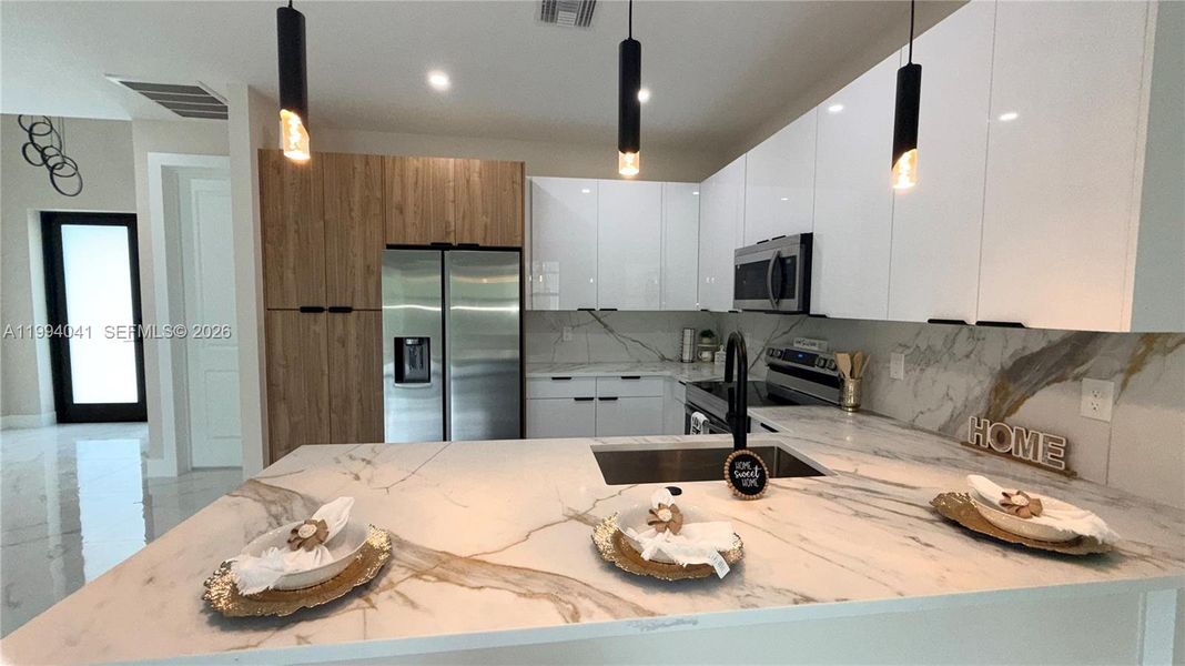 Furnished interior view inside a new home in , Lehigh Acres (Image 8).