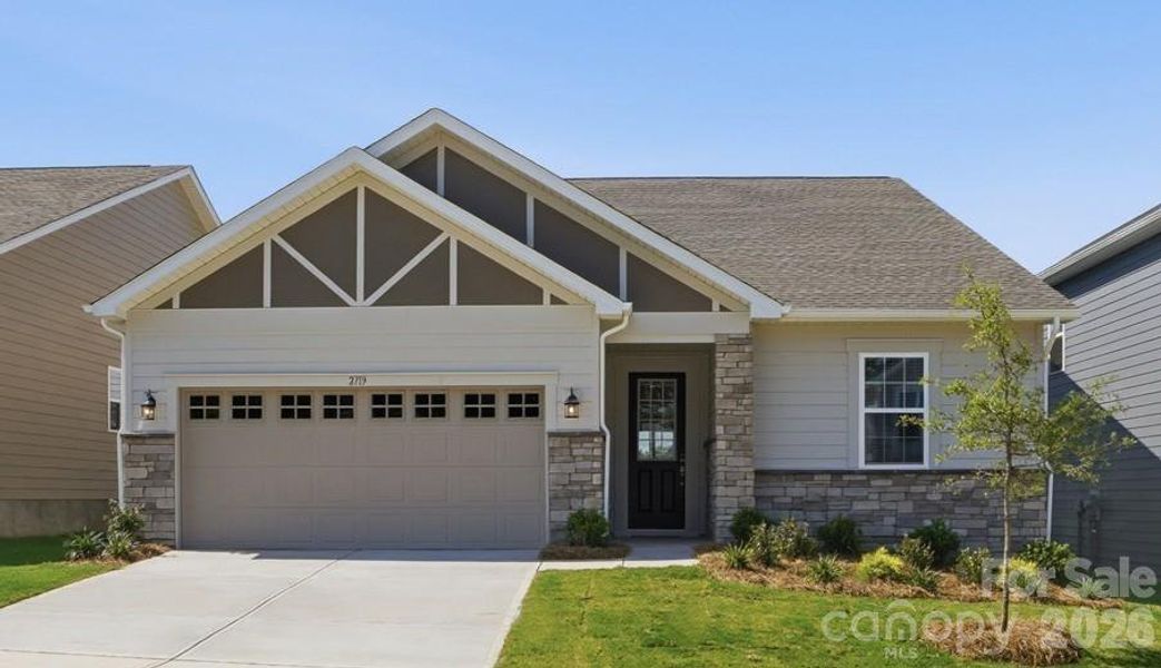 Front exterior of a new home in Westfall, Gastonia, NC, highlighting curb appeal (Image 1). Front exterior of a new home in Westfall, Gastonia, NC, highlighting curb appeal (Image 1).