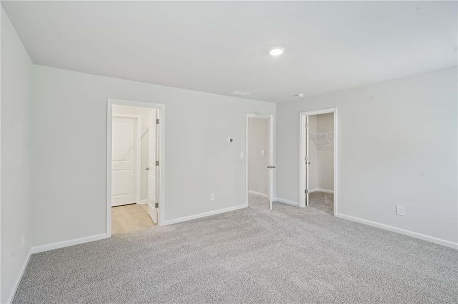 Spacious, unfurnished interior of a new home in Avalon - Parc Series, Conyers (Image 15). Spacious, unfurnished interior of a new home in Avalon - Parc Series, Conyers (Image 15).