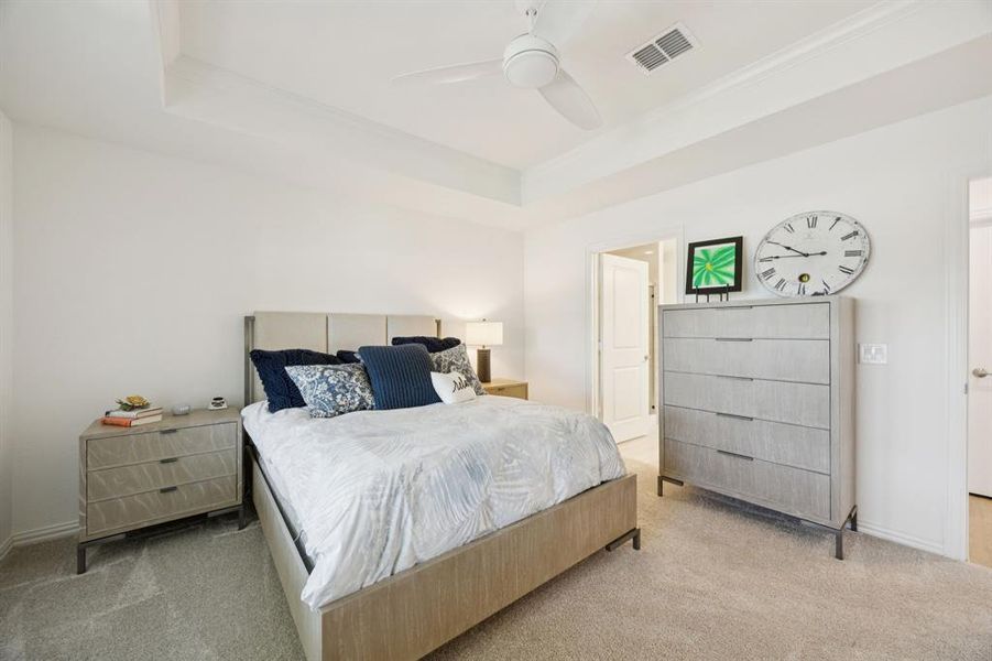 Another view of the primary bedroom. The door that is shown lead to the en suite bathroom.