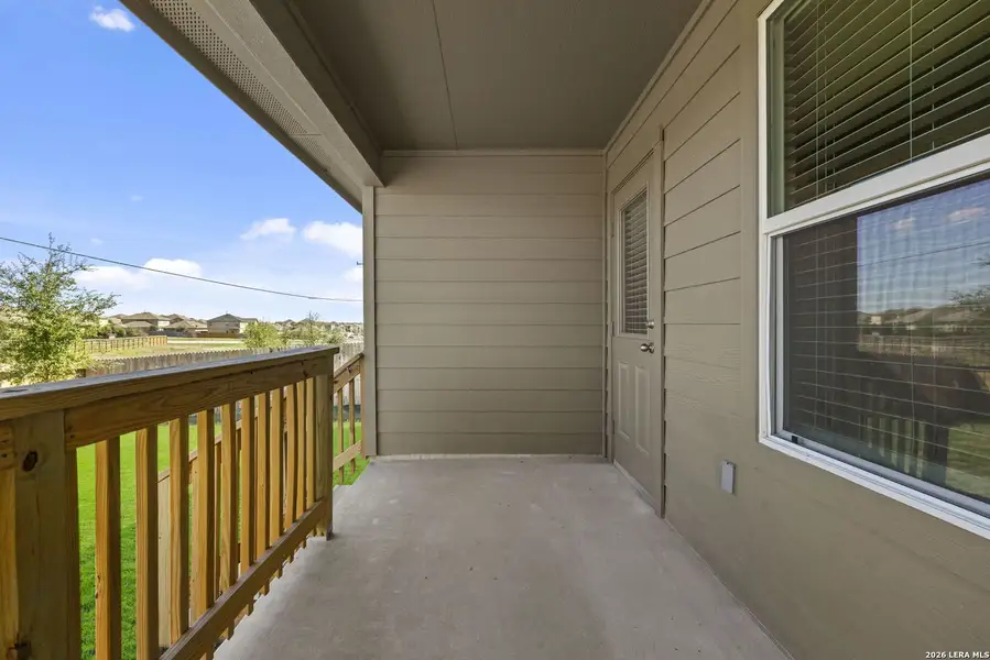 Exterior details and patio area of a home in Redbird Ranch, San Antonio (Image 3).