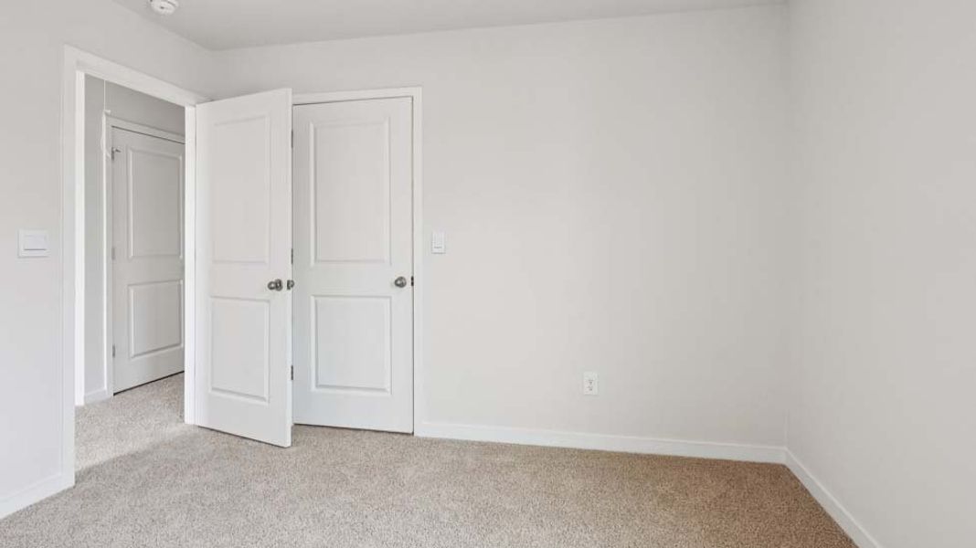 Spacious, unfurnished interior of a new home in Reedy Creek Preserve, Charlotte (Image 22).