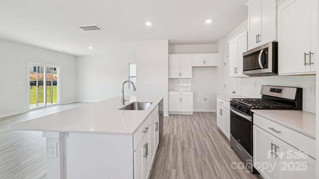 Furnished interior view inside a new home in Cardinal Creek, Charlotte (Image 7).