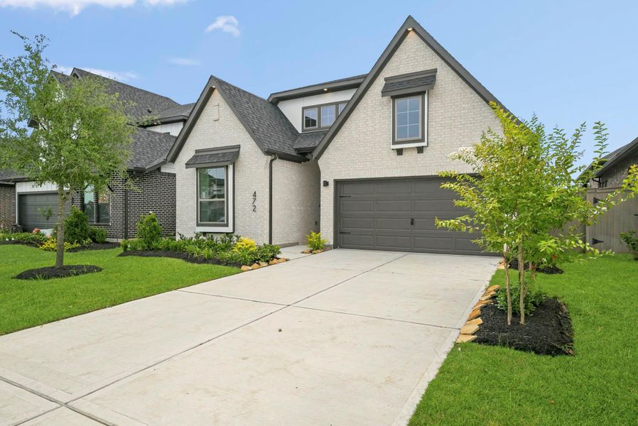 Front exterior of a new home in , Katy, TX, highlighting curb appeal (Image 2). Front exterior of a new home in , Katy, TX, highlighting curb appeal (Image 2).