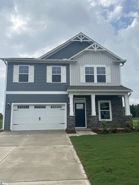 Front exterior of a new home in Shiloh Trail, Wellford, SC, highlighting curb appeal (Image 1). Front exterior of a new home in Shiloh Trail, Wellford, SC, highlighting curb appeal (Image 1).