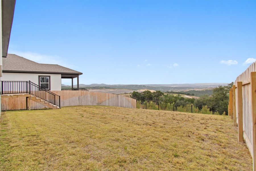 View of yard with a mountain view