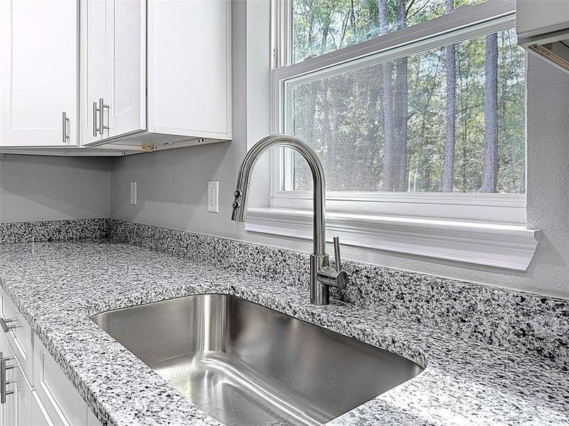 Furnished interior view inside a new home in , Dunnellon (Image 16).