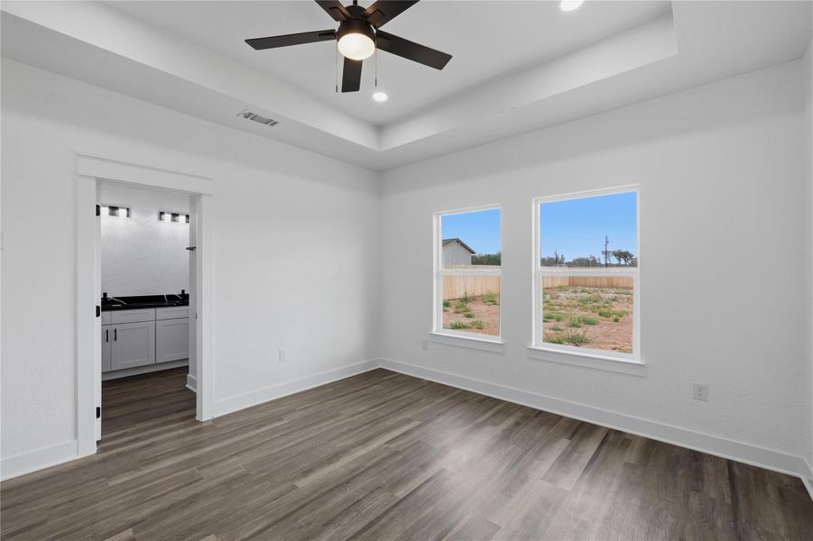 Primary bedroom with dropped ceiling