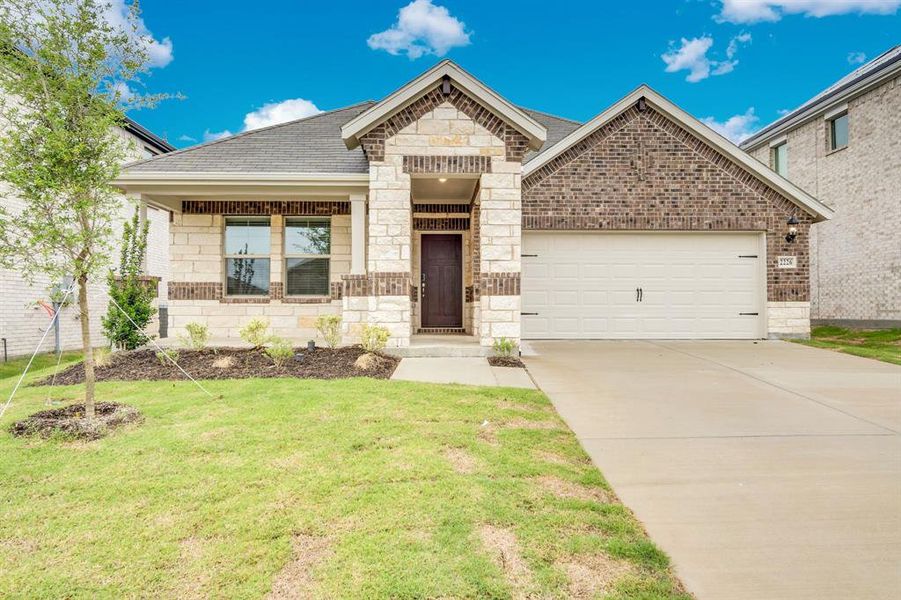 Front exterior of a new home in Stonehaven, Seagoville, TX, highlighting curb appeal (Image 2). Front exterior of a new home in Stonehaven, Seagoville, TX, highlighting curb appeal (Image 2).