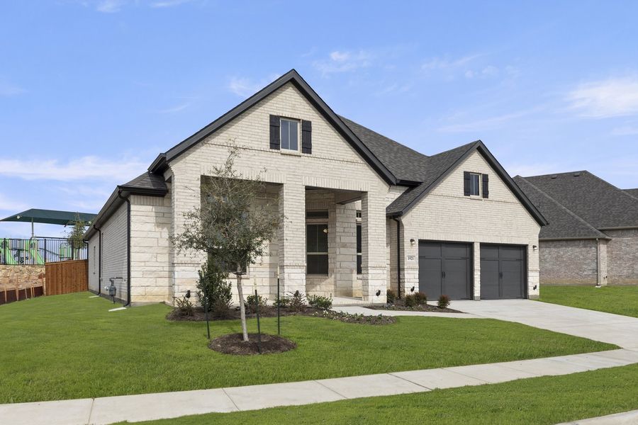 Front exterior of a new home in Brookshire at Legacy Hills, Celina, TX, highlighting curb appeal (Image 2).