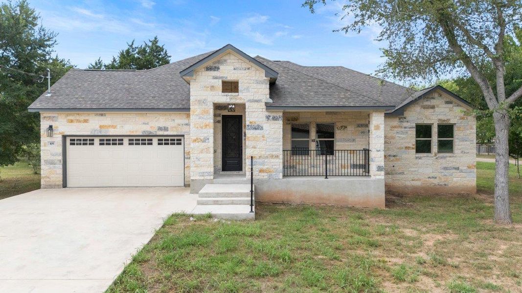 Front exterior of a new home in , Bastrop, TX, highlighting curb appeal (Image 20).