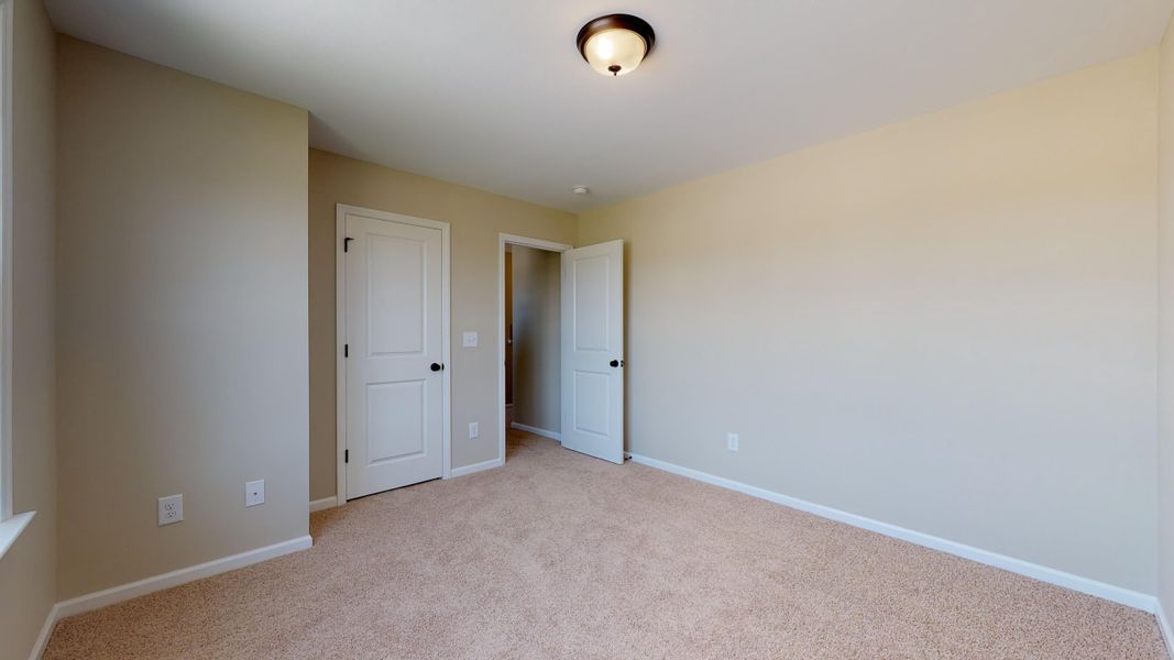 Representative unfurnished interior of a home built from the Rockbridge by Bill Clark Homes in Davenport Farms, Winterville (Image 46).