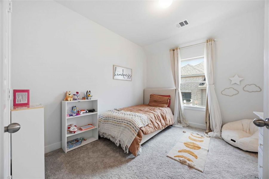 Offering comfort, privacy, and elevated design, each secondary bedroom was created with thoughtful attention to detail.